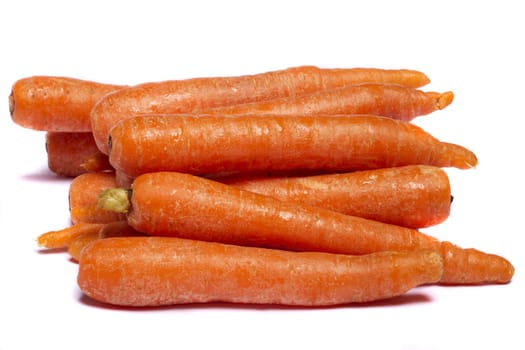 Close up view of a bunch of carrots isolated on a white background.