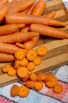 Close up view of a bunch of carrots isolated on a white background.