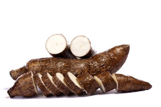 Close up view of the cassava root isolated on a white background.