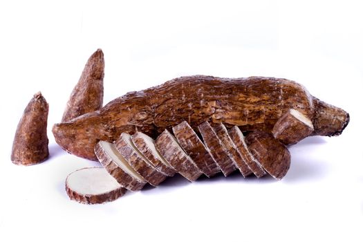 Close up view of the cassava root isolated on a white background.