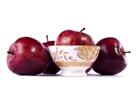 Close up view of some red apples isolated on a white background.