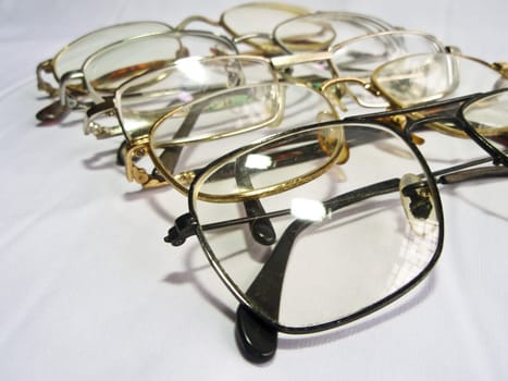 A display of collection of used eye glasses  