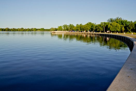 The concrete wall shores of Wascana Lake in Regina, Saskatchewan - Canada