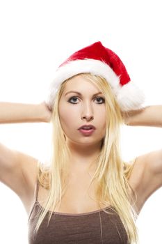 beautiful blonde woman wearing santa's hat on white background