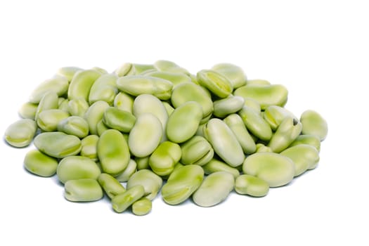 Close up view of some broad beans isolated on a white background.