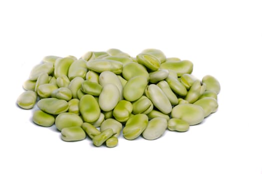 Close up view of some broad beans isolated on a white background.