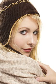 sweet beautiful blonde woman wearing winter fashion on white background