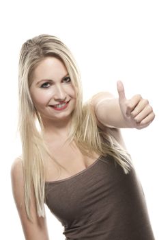 beautiful blonde woman showing thumbs up on white background