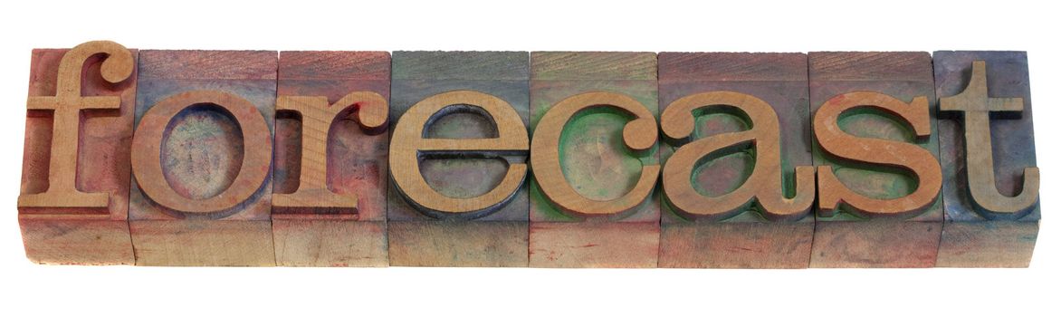 forecast concept - a word in vintage wooden letterpress printing blocks, stained by color inks, isolated on white