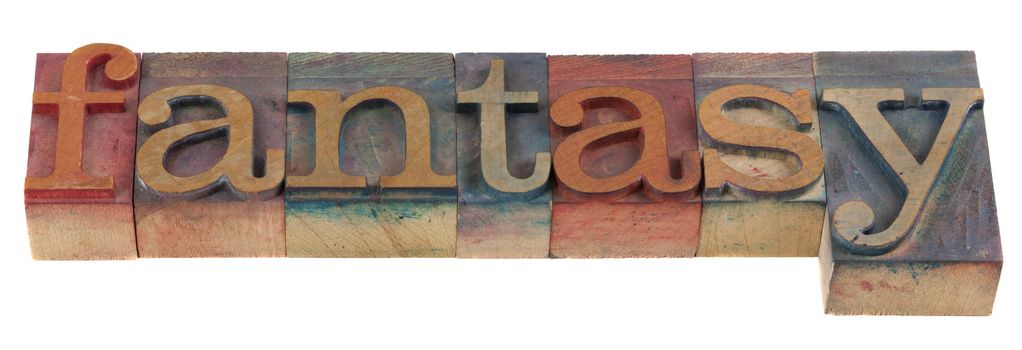 fantasy - word spelled in vintage wooden letterpress prititng blocks