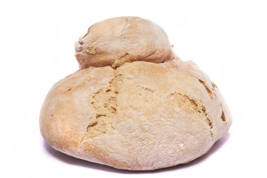 Close up view of a Portuguese traditional baked bread isolated on a white background.
