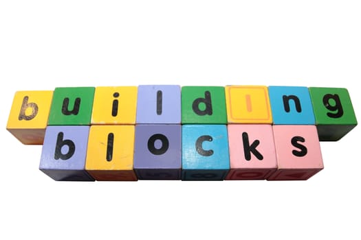 toy letters that spell building blocks with white background and clipping path