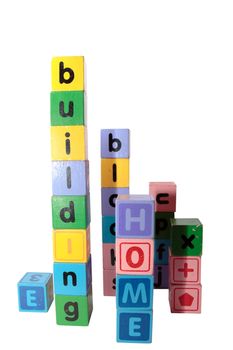 toy letters that spell home building blocks with white background and clipping path