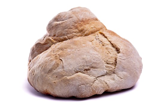 Close up view of a Portuguese traditional baked bread isolated on a white background.