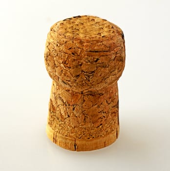 A champagne cork standing over white background