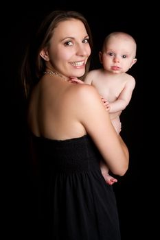 Smiling mother woman holding baby