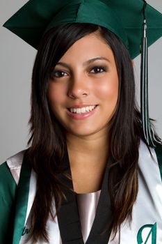 Hispanic high school graduate smiling