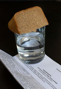 Tax diet - Russian transport tax and a glass of water and bread