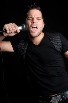 Rock star man singing karaoke
