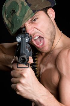 Angry soldier holding maching gun