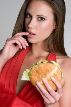Sexy woman eating burger