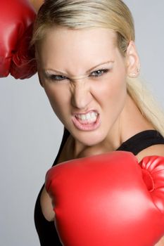Aggressive blond woman boxing