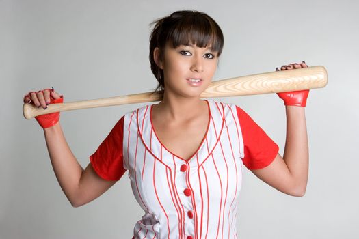 Asian girl holding baseball bat