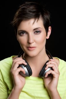 Pretty young woman wearing headphones