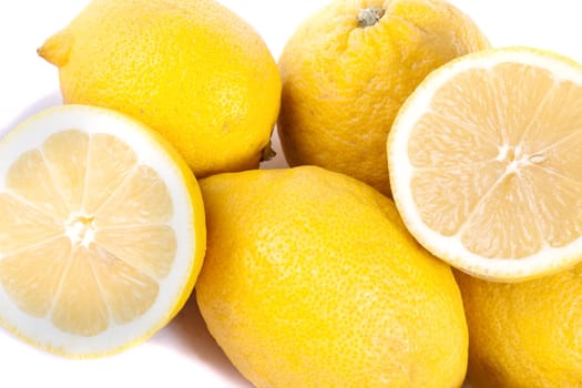 Close up view of bunch of lemons isolated on a white background.