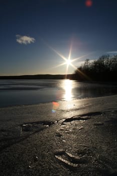 Sun is going down over Maridalsvannet in Oslo.