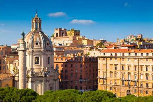 Trajan's Column and the Church of the Most Holy Name of Mary at the Trajan Forum in Rome, Italy