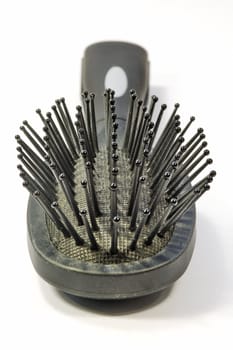 Close front view of a regular black comb