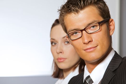 Portrait of smiling businessman and woman