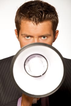 Portrait of businessman with megaphone
