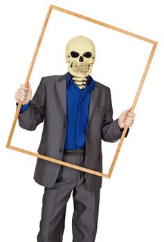A man dressed as a skeleton in a wooden frame on white background