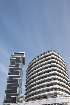 Stylish Unusual Apartment Blocks under a blue sky