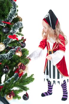 Beautiful baby girl dressed up for Christmas isolated in white