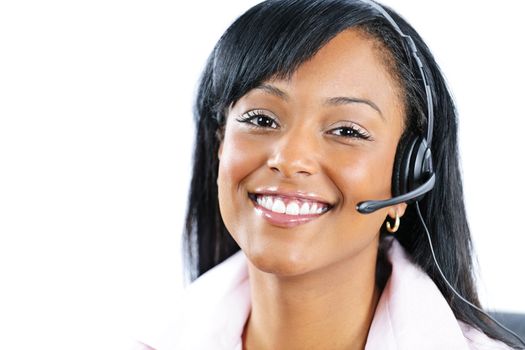 Smiling black customer service and support woman wearing headset