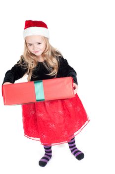 Beautiful baby girl dressed up for Christmas isolated in white