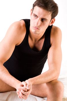 Young man portrait in the studio on a white background