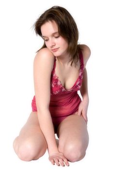 Studio portrait of a young woman in red lingerie