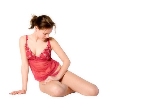 Studio portrait of a young woman in red lingerie