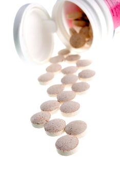 Tablets  ,Pills Spilling out of Pill Bottle closeup