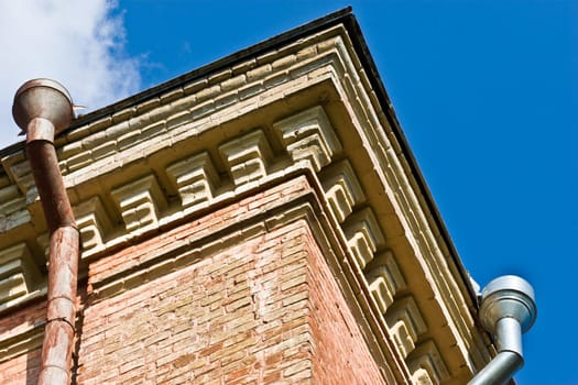 architect series: old stuled building with drainpipe