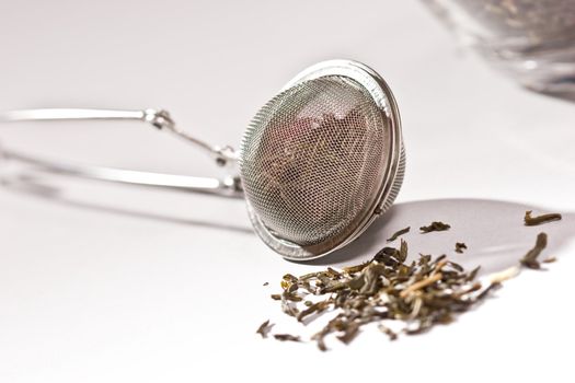 Macro picture of a tea STRAINER over white