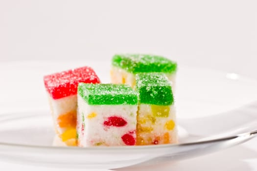 Macro picture of Slices fruit jelly with sugar