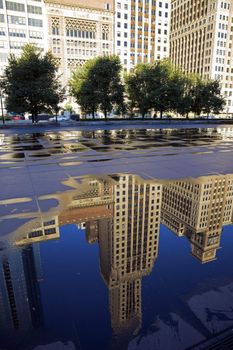 Reflection of Michigan Avenue buildings  in Chicago, IL.
