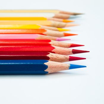 eleven color pencil on white background
