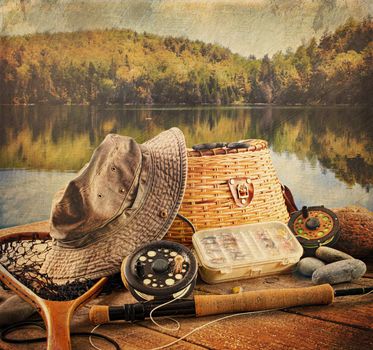 Fly fishing equipment on deck with a vintage look