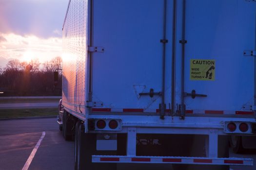 Semi Truck during sunset - seen on rest area.